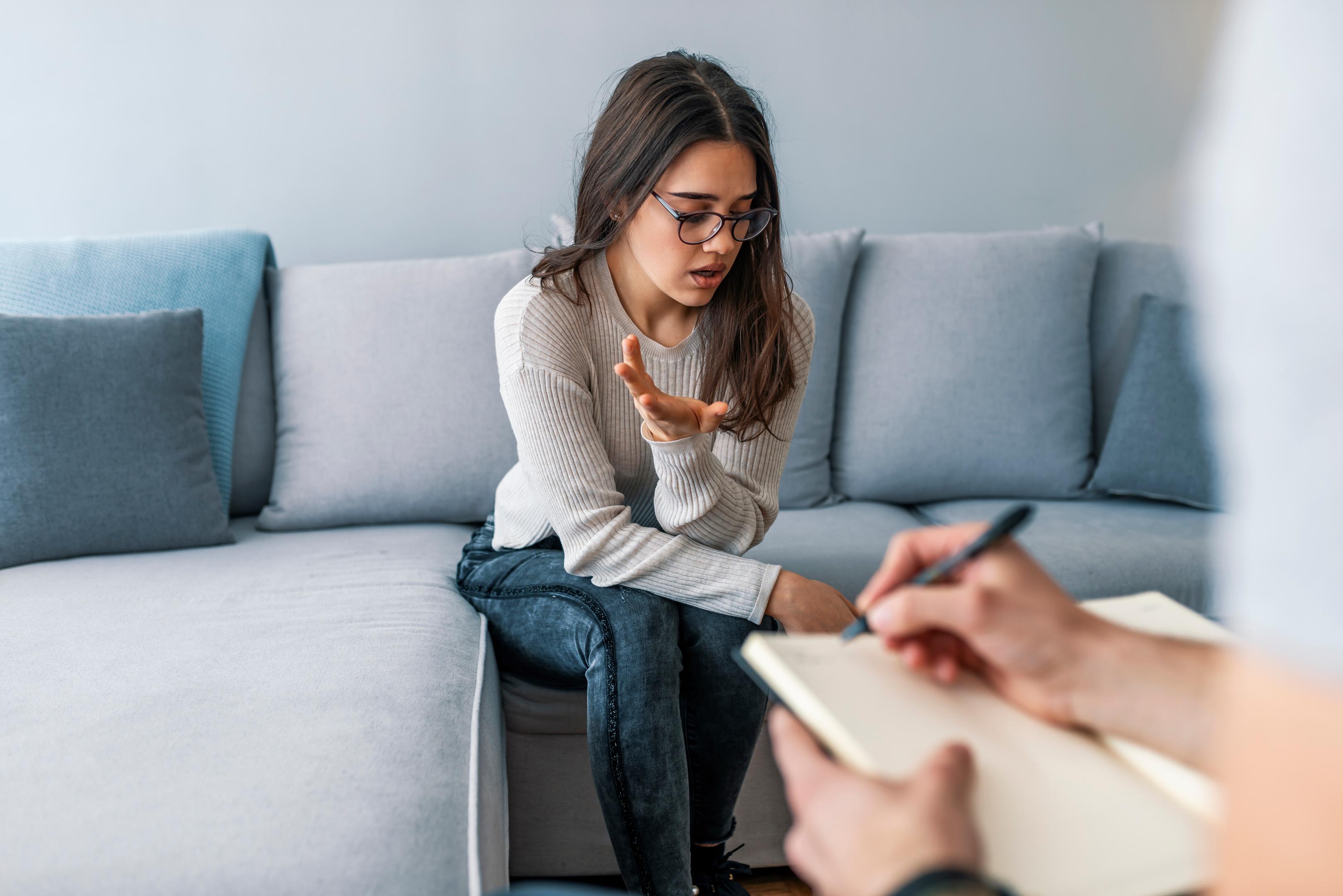 Woman in a drug rehab therapy session