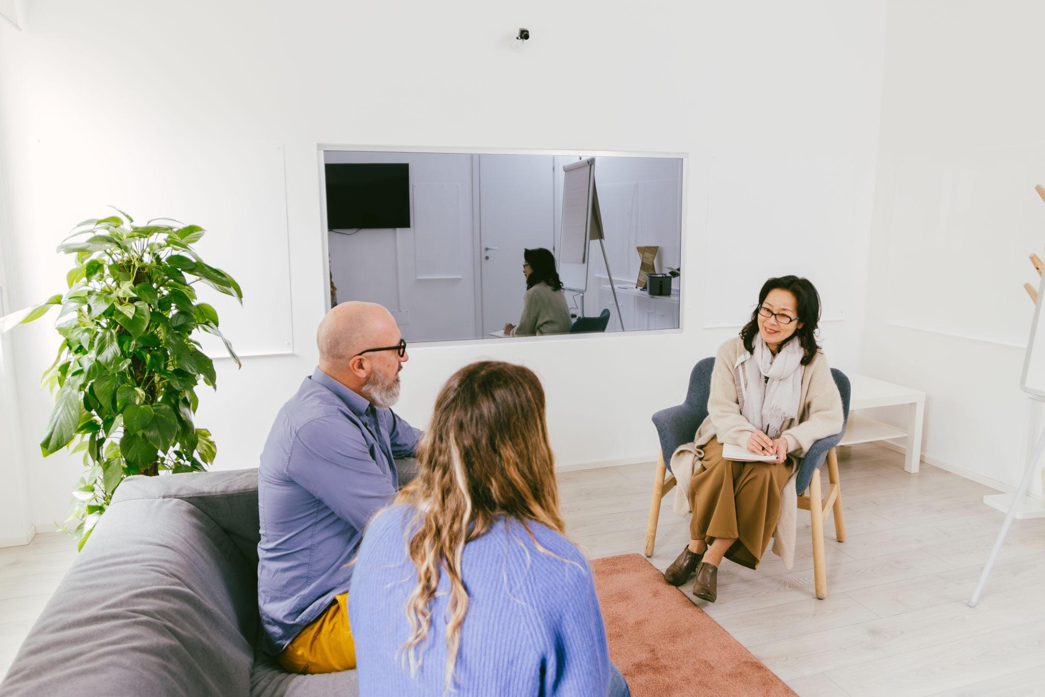 Clients talk to a therapist in PHP care