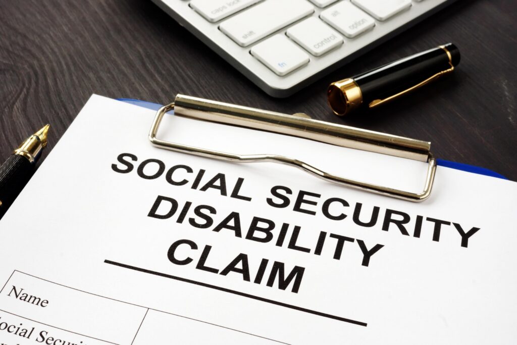 Social Security disability claim form on a clipboard